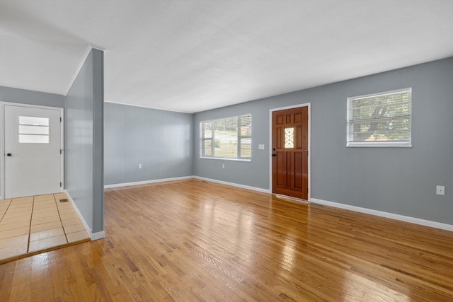 entrance foyer with light wood-type flooring