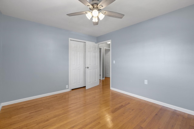 209 Pocahontas St, Newport, TN 37821 - unfurnished bedroom featuring ceiling fan, a closet, and light hardwood / wood-style floors