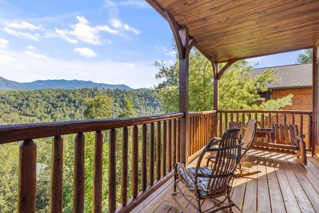 wooden terrace featuring a mountain view