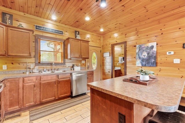 kitchen featuring a kitchen island, sink, a kitchen bar, stainless steel dishwasher, and wood ceiling