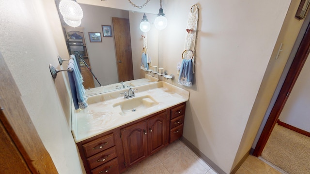 bathroom featuring tile patterned floors and vanity