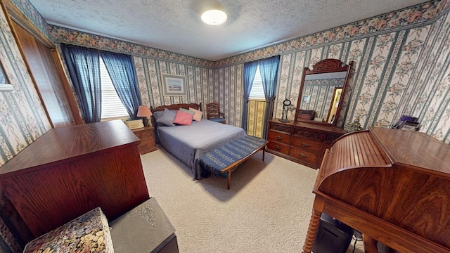 carpeted bedroom featuring a textured ceiling