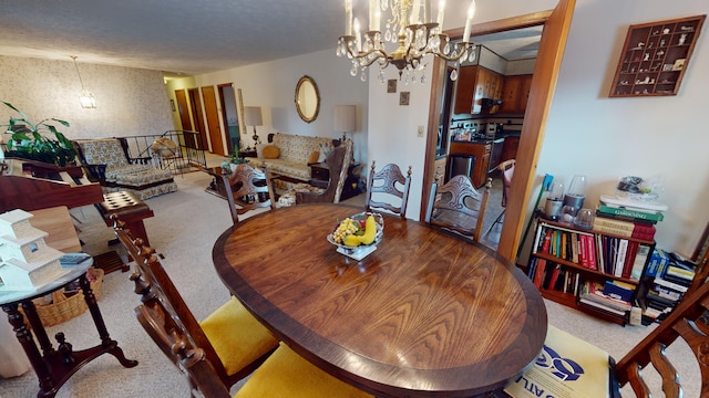 carpeted dining area featuring a notable chandelier