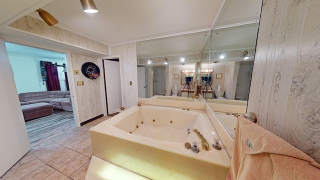 bathroom with separate shower and tub and wood walls