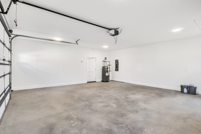 garage featuring electric panel, a garage door opener, and water heater