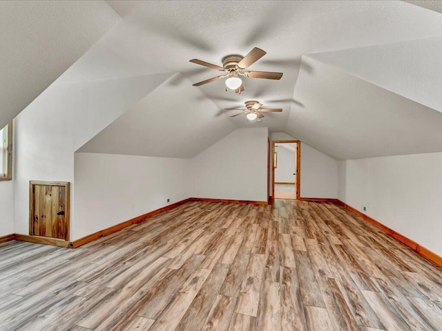 107 Straight Creek Dock Rd, New Tazewell, TN 37825 - bonus room with baseboards, wood finished floors, a ceiling fan, and lofted ceiling