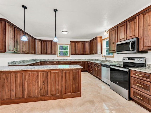 107 Straight Creek Dock Rd, New Tazewell, TN 37825 - kitchen with appliances with stainless steel finishes, healthy amount of natural light, decorative light fixtures, and light stone counters