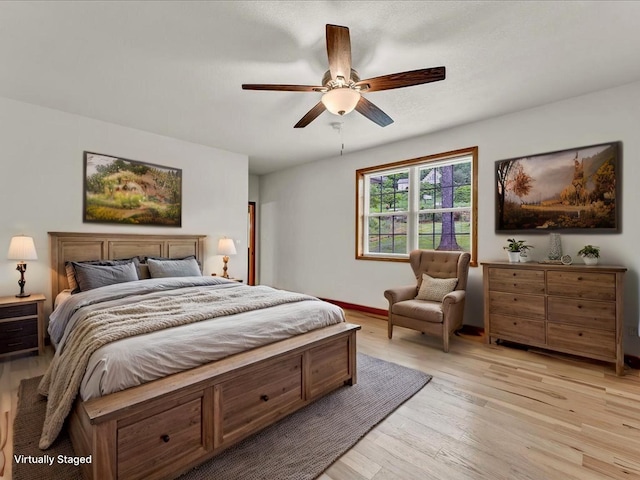 107 Straight Creek Dock Rd, New Tazewell, TN 37825 - bedroom featuring light wood finished floors and ceiling fan