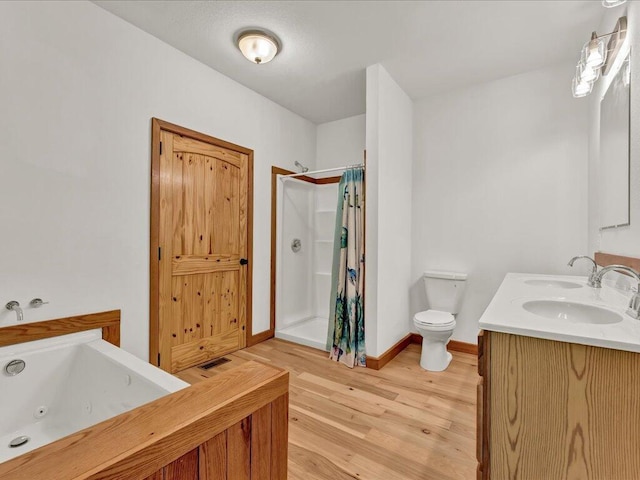107 Straight Creek Dock Rd, New Tazewell, TN 37825 - bathroom featuring wood finished floors, a shower with shower curtain, a tub with jets, toilet, and baseboards