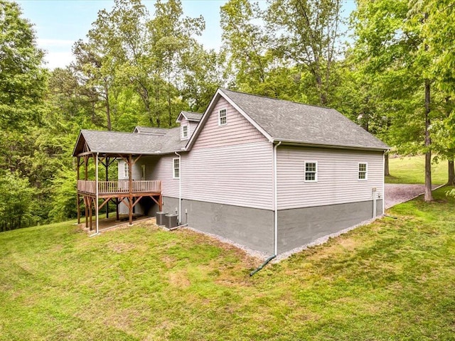 107 Straight Creek Dock Rd, New Tazewell, TN 37825 - view of home's exterior with a deck, a yard, a shingled roof, and central air condition unit