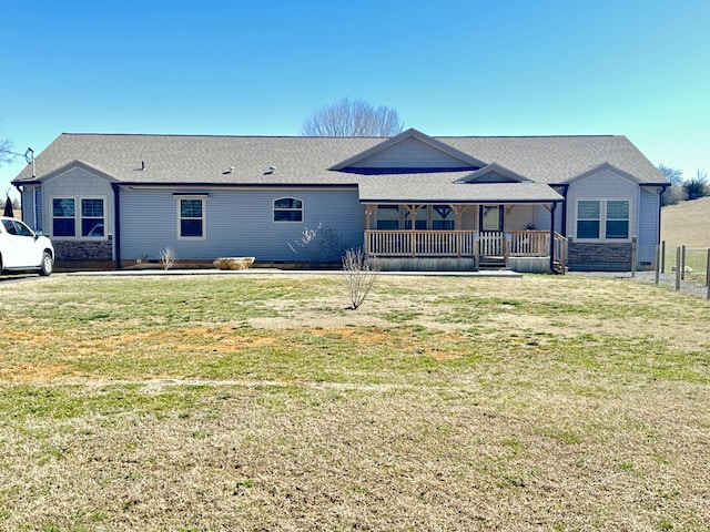 back of house with a yard