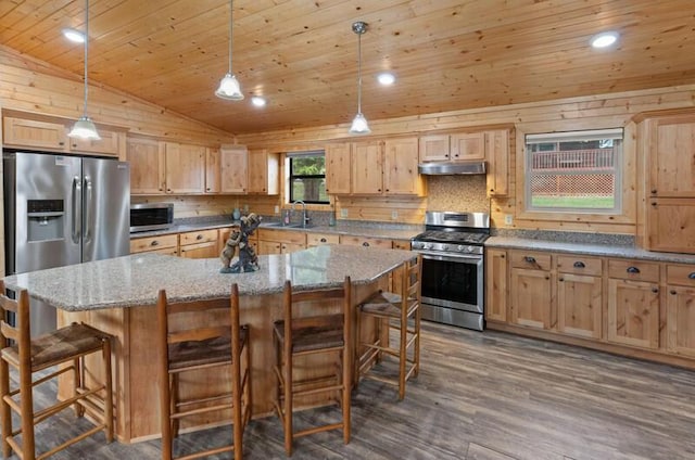 2472 Doe Rd, Newport, TN 37821 - kitchen with appliances with stainless steel finishes, under cabinet range hood, wooden ceiling, light brown cabinetry, and vaulted ceiling