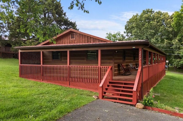 2472 Doe Rd, Newport, TN 37821 - view of front of property with a front yard and board and batten siding