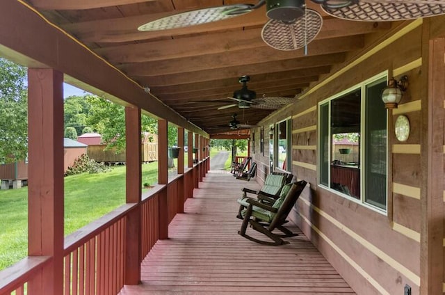2472 Doe Rd, Newport, TN 37821 - wooden deck featuring a ceiling fan and a lawn