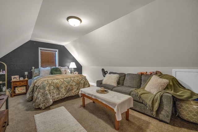 carpeted bedroom featuring vaulted ceiling