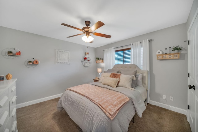 bedroom featuring dark colored carpet and ceiling fan