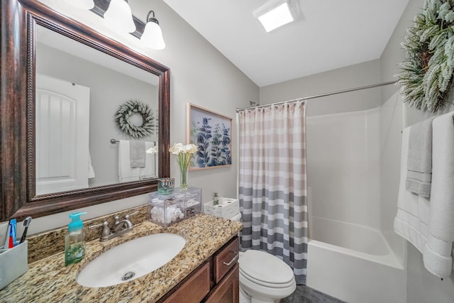 full bathroom featuring shower / bath combination with curtain, toilet, and vanity