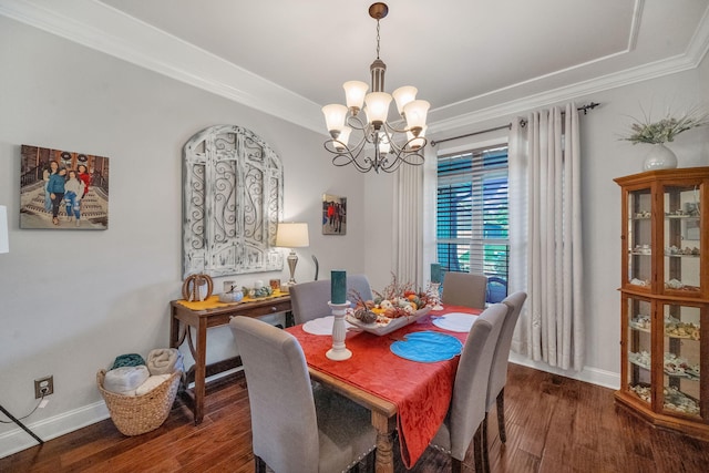 dining area with a chandelier, dark hardwood / wood-style floors, and ornamental molding