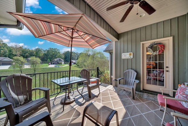 view of patio featuring ceiling fan