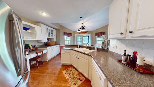 4119 Azalea Ct, Morristown, TN 37814 - kitchen featuring freestanding refrigerator, a sink, dishwasher, dark countertops, and a peninsula