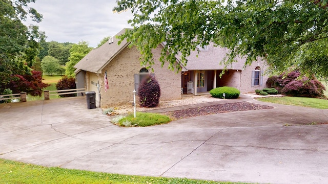 4119 Azalea Ct, Morristown, TN 37814 - view of front of house featuring driveway and brick siding