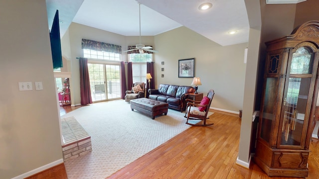 4119 Azalea Ct, Morristown, TN 37814 - living area with arched walkways, light wood-type flooring, ceiling fan, baseboards, and recessed lighting
