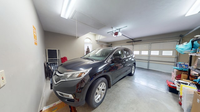 4119 Azalea Ct, Morristown, TN 37814 - garage featuring a garage door opener