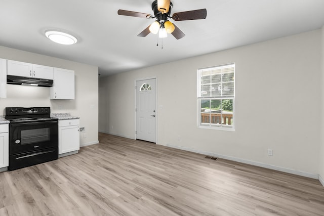 329 Shady Glen Ln, Rutledge, TN 37861 - kitchen with black electric range, under cabinet range hood, light wood-style floors, and white cabinets