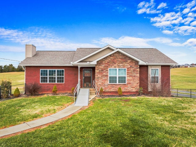 view of front of property featuring a front lawn