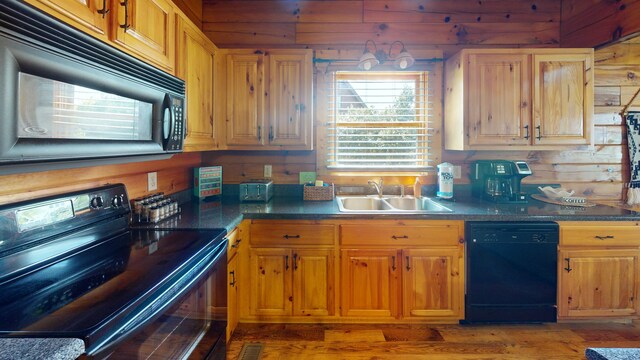 living area with a notable chandelier, wood finished floors, wooden walls, and beamed ceiling