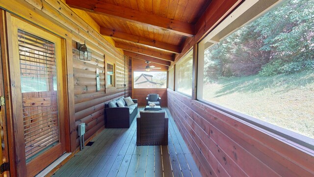 bedroom with vaulted ceiling with beams, wooden ceiling, and hardwood / wood-style flooring