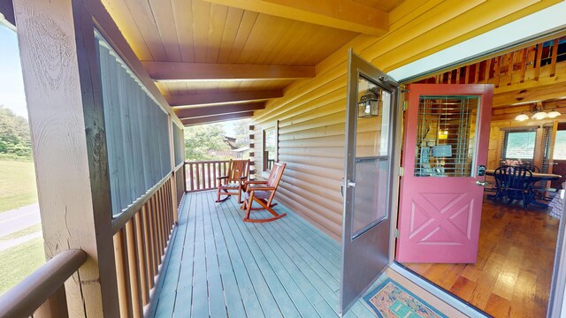 deck with covered porch