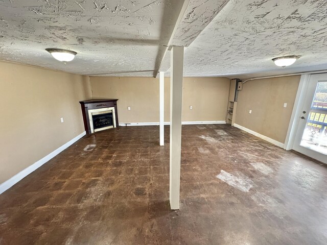 basement with a textured ceiling