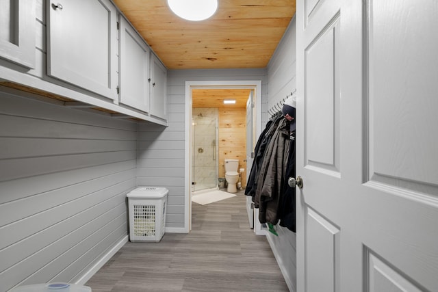 4705 E Hampton Blvd, Morristown, TN 37813 - mudroom featuring wood ceiling, light wood finished floors, wooden walls, and baseboards