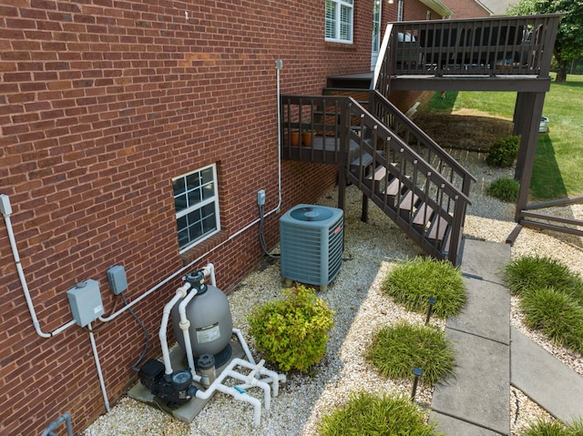 4705 E Hampton Blvd, Morristown, TN 37813 - exterior view of central air condition unit, brick siding, stairs, and pump