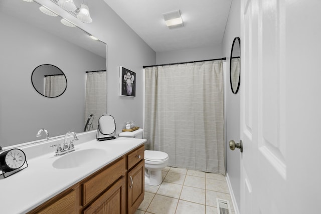 4705 E Hampton Blvd, Morristown, TN 37813 - bathroom featuring vanity, toilet, and tile patterned floors