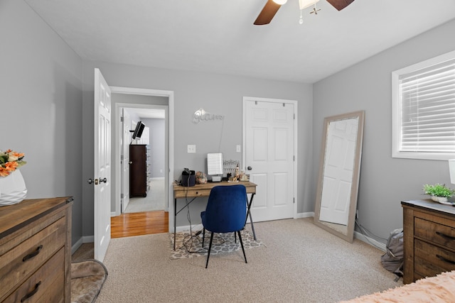 4705 E Hampton Blvd, Morristown, TN 37813 - home office featuring light colored carpet, ceiling fan, and baseboards