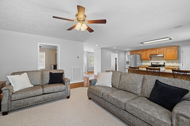 4705 E Hampton Blvd, Morristown, TN 37813 - living room featuring ceiling fan, baseboards, wood finished floors, and recessed lighting