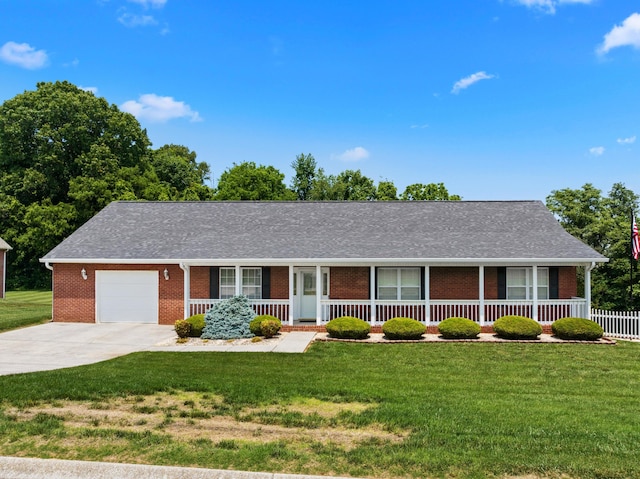 4705 E Hampton Blvd, Morristown, TN 37813 - ranch-style house featuring brick siding, covered porch, concrete driveway, a garage, and roof with shingles