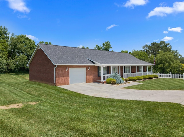 4705 E Hampton Blvd, Morristown, TN 37813 - single story home featuring a porch, a garage, brick siding, concrete driveway, and a shingled roof