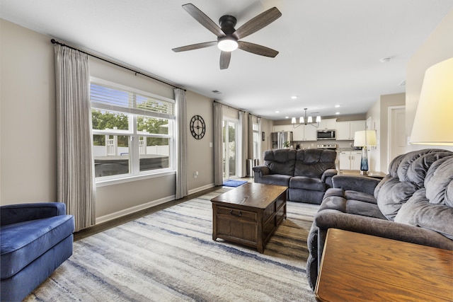 5021 Cottonseed Way, Morristown, TN 37813 - living room with a ceiling fan, a chandelier, recessed lighting, and light wood-style flooring