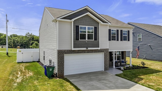 5021 Cottonseed Way, Morristown, TN 37813 - view of front of house with driveway, brick siding, and a garage
