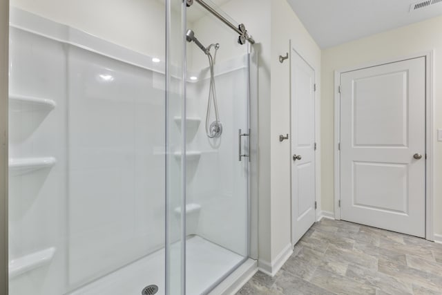 5021 Cottonseed Way, Morristown, TN 37813 - full bathroom featuring a shower stall and stone finish flooring