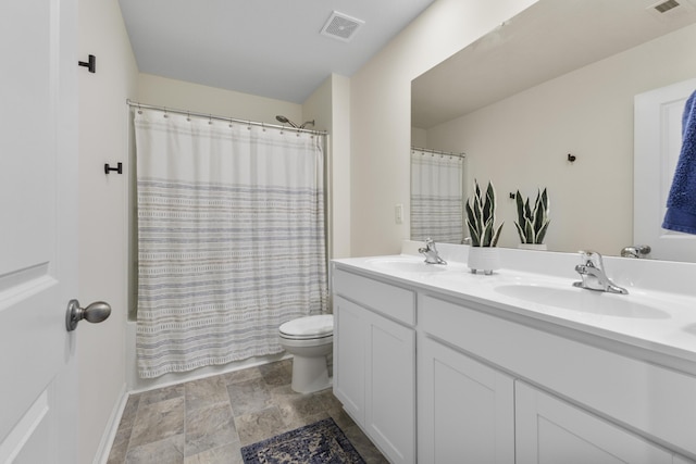 5021 Cottonseed Way, Morristown, TN 37813 - full bathroom featuring double vanity, shower / tub combo, and stone finish flooring