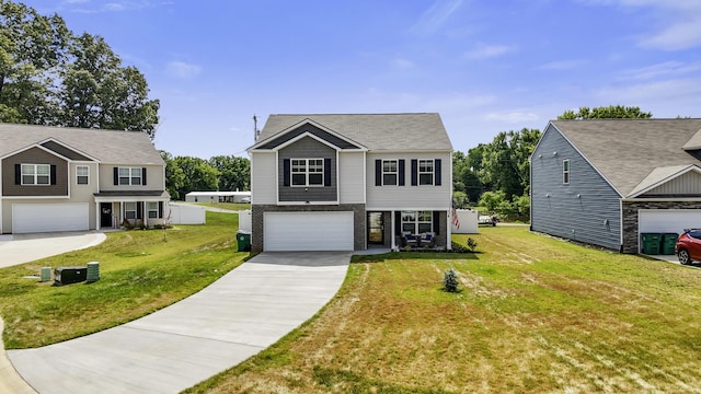 5021 Cottonseed Way, Morristown, TN 37813 - view of front of house featuring an attached garage, concrete driveway, a front yard, and brick siding