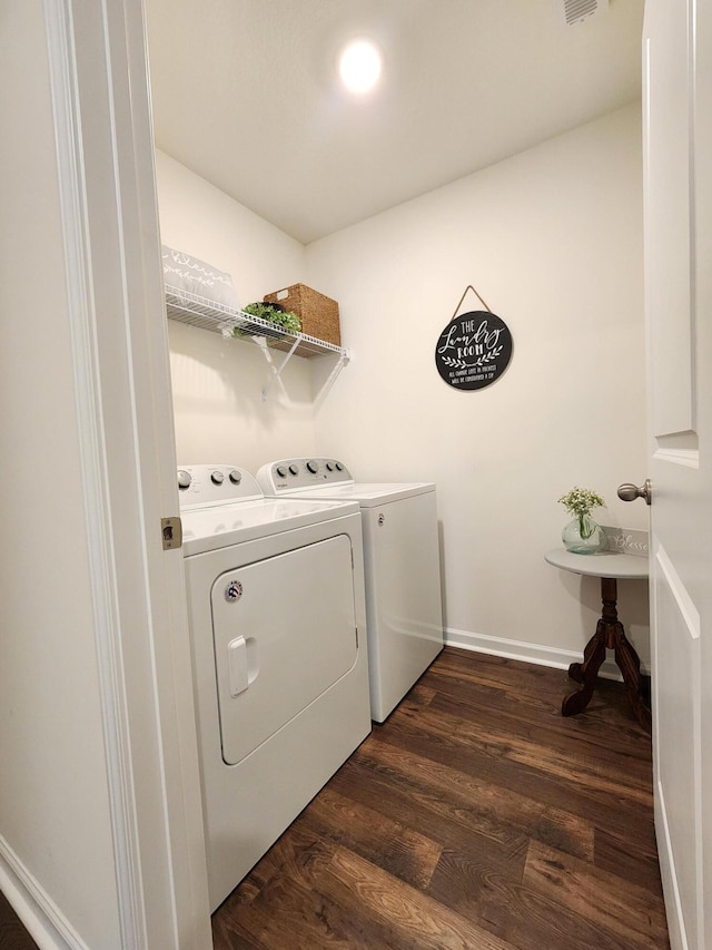 washroom with washer and dryer, laundry area, baseboards, dark wood-type flooring, and visible vents