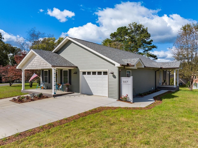 ranch-style home with a porch, a garage, and a front lawn