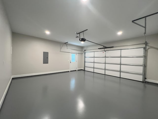 553 Sequoyah Dr, Morristown, TN 37813 - garage featuring a garage door opener, electric panel, recessed lighting, and baseboards
