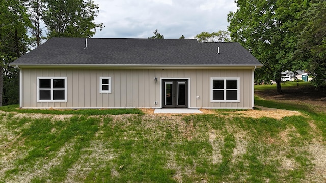 553 Sequoyah Dr, Morristown, TN 37813 - rear view of property featuring french doors, a lawn, and board and batten siding