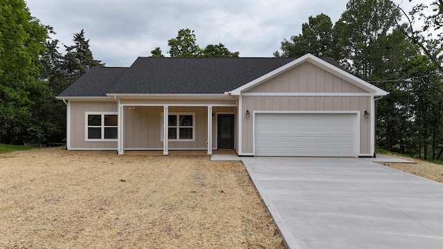 553 Sequoyah Dr, Morristown, TN 37813 - view of front of house featuring concrete driveway, a garage, and a shingled roof